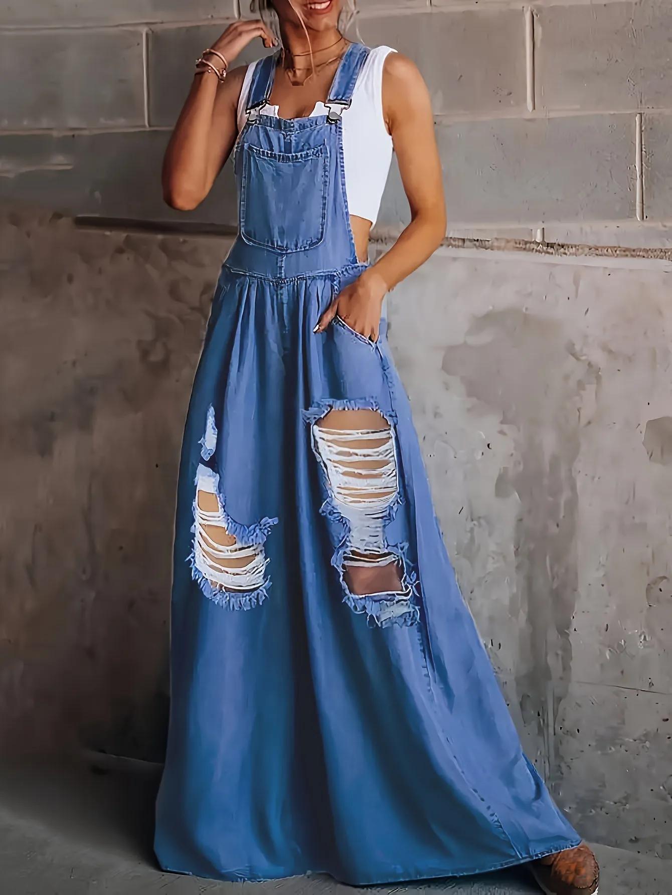 Womens Ripped Denim Jumpsuit - Fashionable Ripped Detail, Loose Fit for Comfort, Trendy Distressed Overall with Stylish Slant Pockets - Casual Everyday Denim Wear